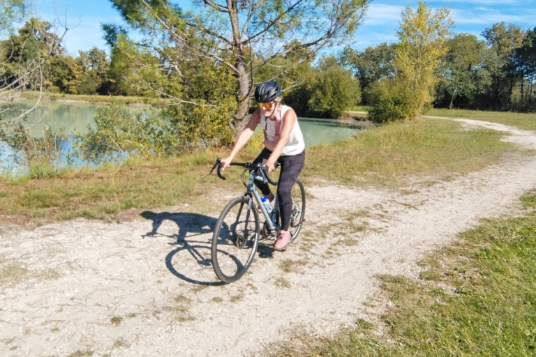 Medoc Gravel Bike Tour | Vineyards, Wine Tasting & Picnic Ride through Medoc vineyards on a gravel bike tour from Bordeaux. White gravel paths, French picnic lunch and wine tasting in Margaux.